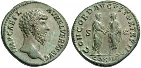 Lucius Verus, 161 – 169. Sestertius 161-162, Æ 20.46 g. Bare head r. Rev. M. Aurelius and L. Verus clasping hands. C 36. RIC 1308.
Lovely green patin...