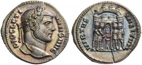 Diocletian, 284 – 305. Argenteus, Siscia circa 294, AR 3.26 g. Laureate head r. Rev. The four tetrarchs sacrificing over tripod before eight-turreted ...