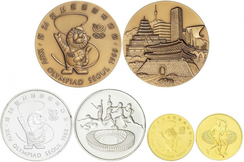 WORLD COINS: KOREA
Set 3 Medallas. 1988. JUEGOS OLÍMPICOS. SEUL. Anv.: Mascota ...