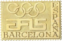 SPANISH MEDALS
Plaqueta en forma de sello. S/F. AFIS. BARCELONA. Anv.: AFIS BARCELONA ESPAÑA. Aros Olímpicos. 15,44 grs. AU (750). Ø 34x22 mm. SC.