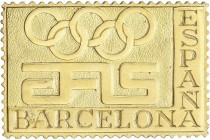 SPANISH MEDALS
Plaqueta en forma de sello. S/F. AFIS. BARCELONA. Anv.: AFIS BARCELONA ESPAÑA. Aros Olímpicos. 15,38 grs. AU (750). Ø 34x22 mm. SC.