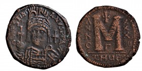 JUSTINIAN I, 527-565, AD, 
Æ-Follis, Condition: Very Good 18.2 gr. 33 mm.