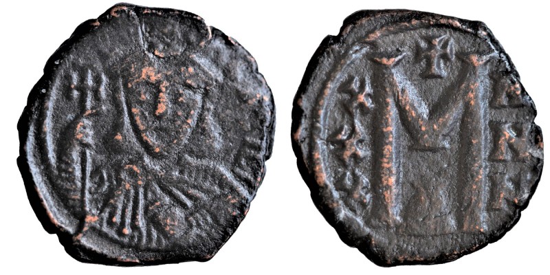 Nicephorus I AD 802-811. 
Constantinople. Follis Æ, Condition: Very Good 5.7 gr...