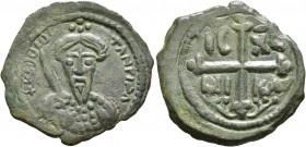 CRUSADERS. Antioch. Tancred, regent, 1101-1112. Follis (Bronze, 22 mm, 3.00 g, 6 h). ΚΕ ΒΟIO TANPI ςΛ (sic!) Cuirassed bust of Tancred facing, wearing...