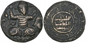 Artuqid of Mardin, Yuluq Arslan (580-597h), AE dirham, 596h, Turkish warrior seated cr0ss-legged holding sword and severed head, 12.38g (SS 36), very ...