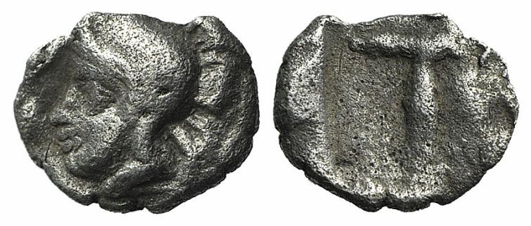 Arkadia, Tegea, c. 423-400 BC. AR Tetartemorion (5mm, 0.17g, 12h). Helmeted head...