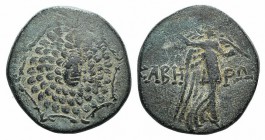 Pontos, Kabeira, c. 120-100 BC. Æ (21mm, 6.13g, 12h). Three-quarter facing head of gorgoneion, head turned slightly r., on an aegis. R/ Nike walking r...