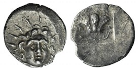 Islands of Caria, Rhodos, Rhodes, c. 125-88 BC. AR Hemidrachm (12mm, 1.43g, 11h). Uncertain magistrate. Radiate head of Helios facing slightly r. R/ R...