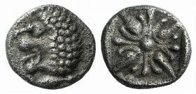 Ionia, Miletos, late 6th-early 5th century BC. AR Hemiobol (5mm, 0.30g). Forepart of a lion r., head l. R/ Stellate design within square incuse. Cf. S...