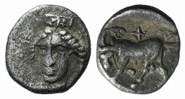 Ionia, Phygela, c. 400-350 BC. AR Hemiobol (6mm, 0.33g, 11h). Head of Artemis Munychia facing slightly l. R/ Bull butting l., palm and cross above. SN...