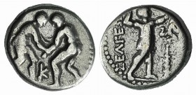 Pisidia, Selge, c. 325-250 BC. AR Stater (21mm, 9.79g, 12h). Two wrestlers grappling; K between. R/ Slinger standing r.; to r., clockwise triskeles ab...