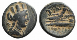 Phoenicia, Arados, c. 176/5 BC - AD 115/6. Æ (19mm, 7.02g, 1h). Dated CY 128 (132/1 BC). Turreted and draped bust of Tyche r.; palm over shoulder. R/ ...