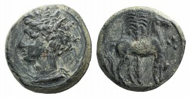 Carthage, c. 400-350 BC. Æ (14.5mm, 2.63g, 9h). Wreathed head of Tanit l. R/ Horse standing r. before palm tree; three pellets to r. MAA 18 var. (one ...