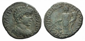 Caracalla (198-217). Caria, Peltae. Æ (21mm, 5.27g, 6h). T. Arion, strategus. Laureate, draped and cuirassed bust r., seen from behind. R/ Tyche Soter...