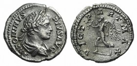 Caracalla (198-217). AR Denarius (19mm, 3.05g, 12h). Rome, AD 202. Laureate and draped bust r. R/ Victory advancing l., holding wreath and palm frond....