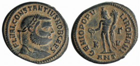 Constantius I (Caesar, 293-305). Æ Follis (26mm, 12.29g, 7h). Antioch, 300-1. Laureate head r. R/ Genius standing l., holding patera and cornucopia; K...