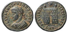 Crispus (Caesar, 316-326). Æ Follis (17mm, 2.94g, 12h). Nicomedia, 324-5. Laureate, draped and cuirassed bust l. R/ Camp-gate with no doors and two tu...