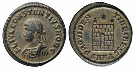 Constantius II (Caesar, 324-337). Æ Follis (19mm, 2.49g, 6h). Nicomedia, 328-9. Laureate, draped and cuirassed bust l. R/ Camp gate, two turrets, no d...