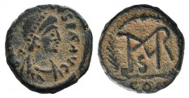 Marcian (450-457). Æ (12mm, 1.82g, 6h). Constantinople. Diademed, draped, and cuirassed bust r. R/ Monogram of Marcian within wreath; CON. RIC X 546. ...