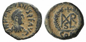 Marcian (450-457). Æ (9mm, 0.96g, 1h). Constantinople. Pearl-diademed, draped and cuirassed bust r. R/ Monogram, cross above, all within wreath; CON. ...