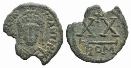 Tiberius II Constantine (578-582). Æ 20 Nummi (20mm, 3.37g, 6h). Uncertain military mint. Crowned and cuirassed bust facing, holding globus cruciger a...