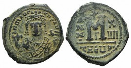 Maurice Tiberius (582-602). Æ 40 Nummi (29mm, 12.30g, 6h). Theoupolis (Antioch), year 14 (595/6). Crowned facing bust, wearing consular robes, holding...
