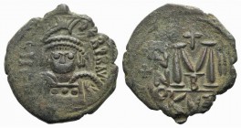 Heraclius (610-641). Æ 40 Nummi (28mm, 8.95g, 6h). Cyzicus, year 3 (612/3). Helmeted and cuirassed facing bust, holding globus cruciger and shield. R/...