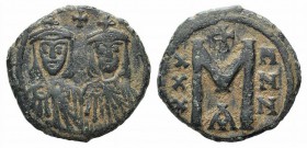 Leo III and Constantine V (717-741). Æ 40 Nummi (22mm, 4.70g, 6h). Constantinople, c. 735-741. Crowned facing busts of Leo and Constantine, each holdi...
