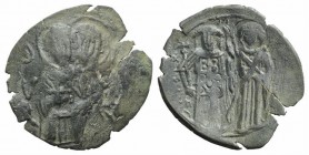 Michael VIII Palaeologus (1261-1282). Æ Trachy (24mm, 2.11g, 6h). Constantinople. St. Tryphon facing, holding cross. R/ Michael standing on l., holdin...