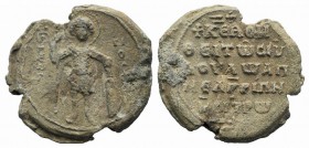 Apnelgaripes, Magistros, 11th-12th century. PB Seal (30mm, 15.66g, 12h). St. George standing facing, wearing military dress, holding spear in r. hand,...