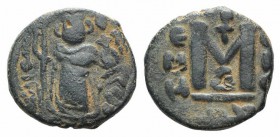 Islamic, Arab-Byzantine, Umayyad Caliphate, c. AD 661-697. Æ Fals (18mm, 4.04g, 6h). Hims (Emesa). Byzantine style emperor standing facing, holding lo...