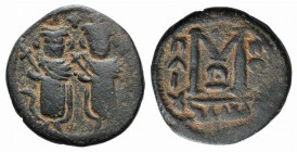 Islamic, Arab-Byzantine, Umayyad Caliphate. temp. Mu'awiya I ibn Abi Sufyan (AH 41-60 / AD 661-680). Æ Fals (19mm, 3.72g, 5h). Baalbek (Heliopolis). T...