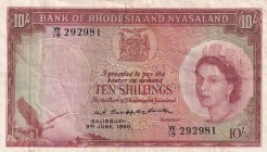 Rhodesia & Nyasaland, 10 Shilings, 1960, VF, p20
I have a little rupture in my upper part
Queen Elizabeth II. Potrait
Serial Number: W/19 292981
E...