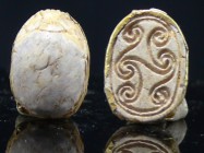 Egypte - Basse époque - Scarabée en calcite - 664 / 332 av. J.-C. (26ème-30ème dynastie)
Scarabée en calcite blanc avec un reste de cerclage en or et...