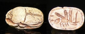 Egypte - Basse époque - Scarabée en calcite - 664 / 332 av. J.-C. (26ème-30ème dynastie)
Scarabée en calcite blanc décoré de hiéroglyphes dont un qui...