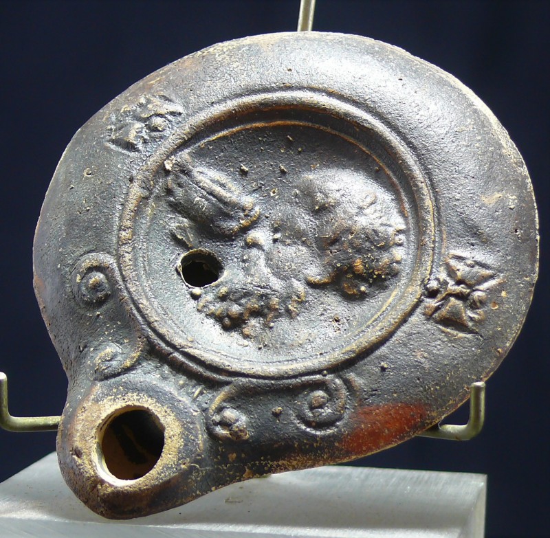 Romain - Lampe représentant " Bacchus" - 0 / 100 ap. J.-C.
Lampe représentant B...