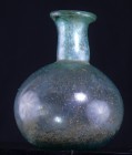 Romain - Flacon romain en verre irisé - 100 / 200 ap. J.-C.
Flacon en verre irisé bleu, à panse sphérique. Aucune trace de restauration. Dimensions :...