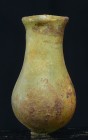 Romain - Balsamaire en verre irisé - 100 / 300 ap. J.-C.
Joli balsamaire en verre irisé de couleur verte. L'objet est de forme allongée avec une pans...