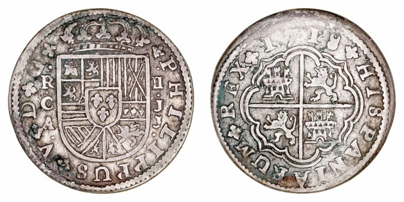 Felipe V
2 Reales. AR. Cuenca JJ. 1718. 5.28g. Cal.670 (2019). Puntos de verdín...