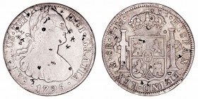 Carlos IV
8 Reales. AR. Méjico FM. 1795. Variados resellos orientales. 26.66g. Cal.958 (2019). (MBC-).