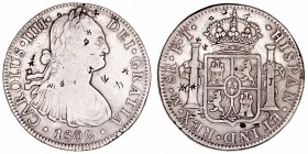 Carlos IV
8 Reales. AR. Méjico FT. 1802. Variados resellos orientales. 26.74g. Cal.975 (2019). MBC.