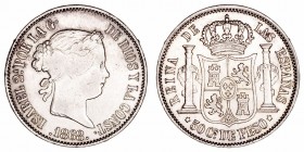 Isabel II
50 Centavos de Peso. AR. Manila. 1868. 12.91g. Cal.667 (2019). MBC.
