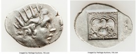 CARIAN ISLANDS. Rhodes. Ca. 88-84 BC. AR drachm (17mm, 2.10 gm, 12h). Choice XF. Plinthophoric standard, Nicephorus, magistrate. Radiate head of Helio...