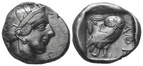 ATTICA. Athens. AR Tetradrachm. ca. 454-415 B.C.
Obv: Helmeted head of Athena right; 
Reverse: Owl standing right, head facing, olive sprig behind, al...