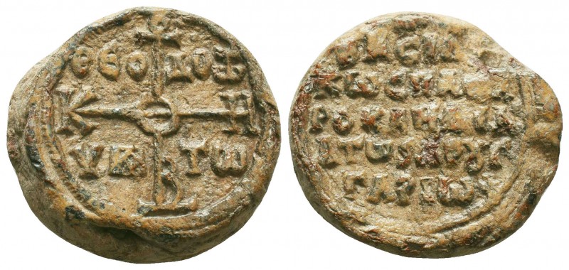 Byzantine lead seal of Theodotos hypatos, imperial spatharokandidatos and droung...