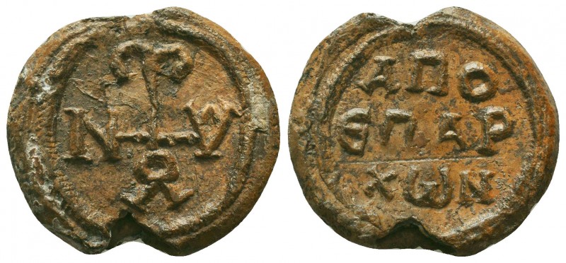 Byzantine lead seal of Ioannes (John), honorary eparch
(7th cent.)

Obverse: ...