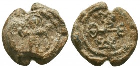 Byzantine lead seal of Theodoros officer
(7th cent.)

Obverse: A military saint standing, facial, nimbate, holding spear and shield, two crosses in...