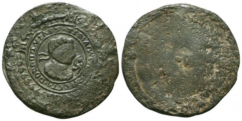 Medieval period lead theriac seal of a medecine bottle

Obverse: A man's head to...