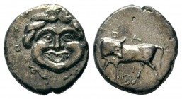 Parion , Mysia. AR Tetrobol c. 350-300 BC. Obv. Bull standing left, head turned back; below, omphalos.Rev. Gorgoneion facing.SNG München 2327; SNG BN ...