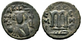 ARAB-BYZANTINE, Rashidun Caliphate, AE fals, c. 637-643.

Weight: 4,03gr
Diameter: 20,00 mm